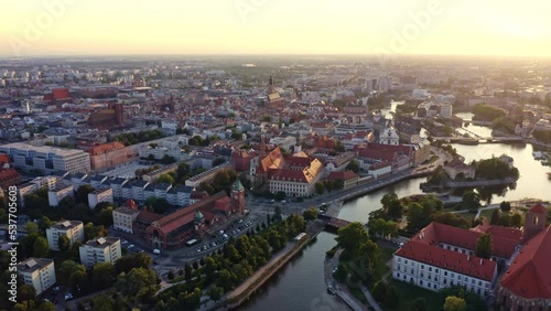 Wallpaper Mural 4k aerial footage summer sunset view on Oder river and old Center of Wroclaw, western Poland. Europe stunning architecture in green cityscape. Slow traffic at the weekend evening. Urban eclectic. Torontodigital.ca