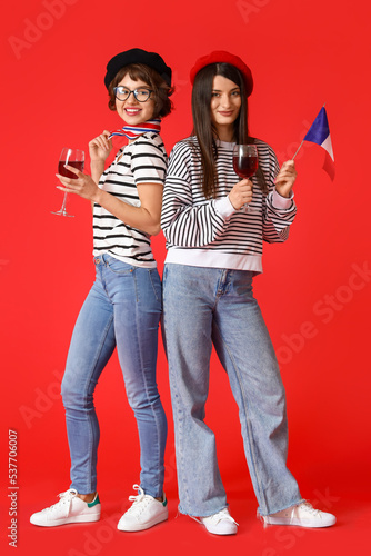 Young women with flag of Fr...
