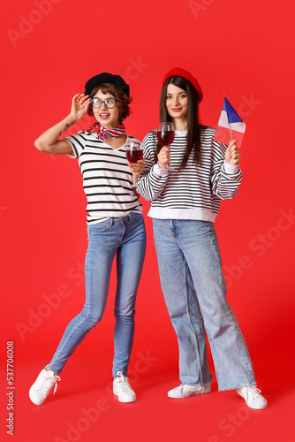 Young women with flag of Fr...