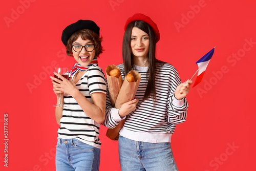 Young women with flag of Fr...