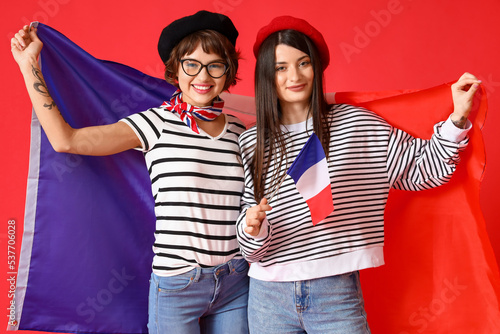 Young women with flags of F...