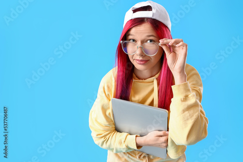 Young female student with b...
