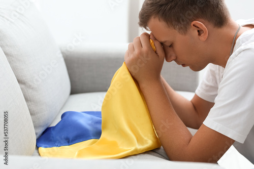Young man with flag of Ukra...