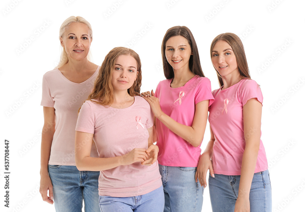 Obraz premium Beautiful women with pink awareness ribbons on white background. Breast cancer concept