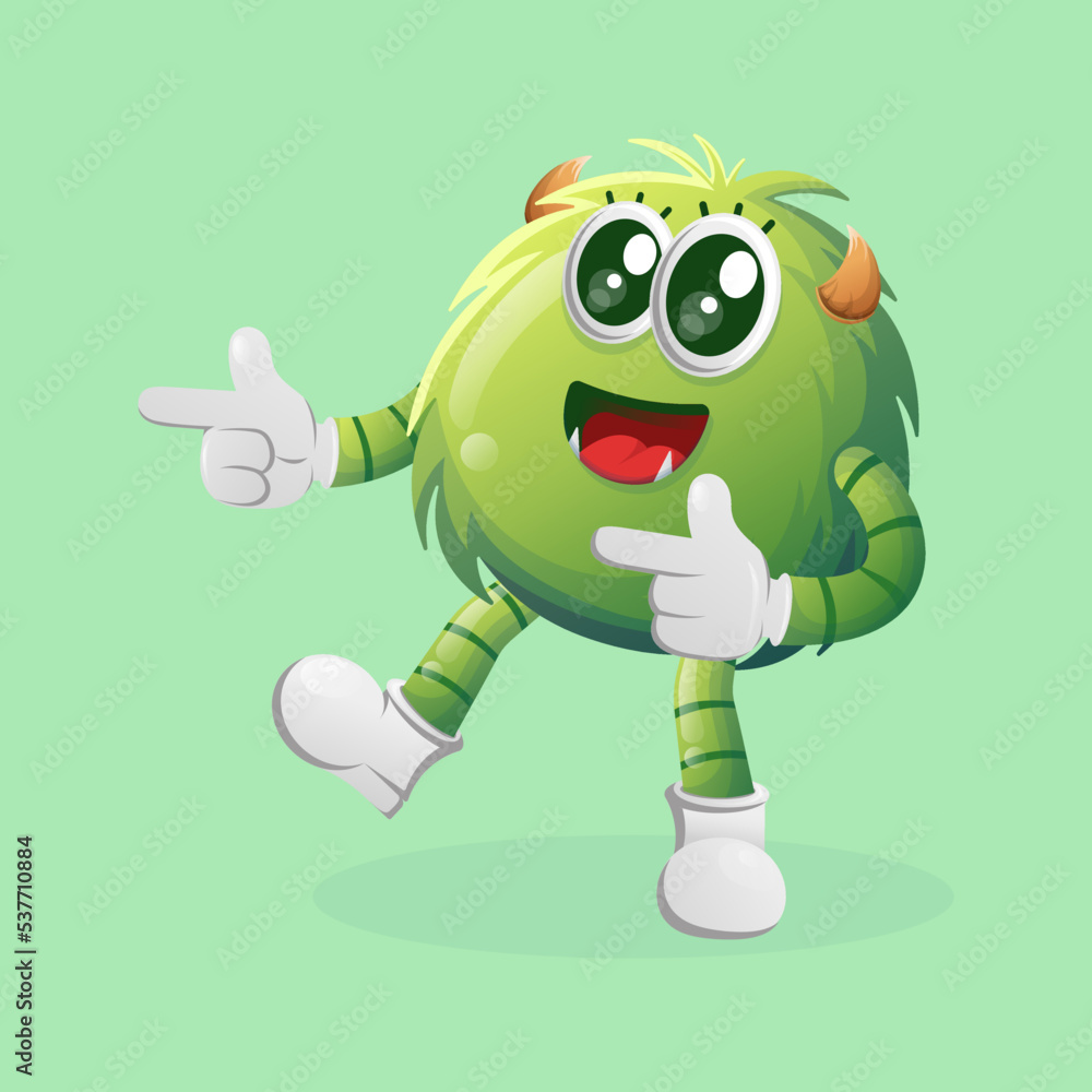 Obraz premium Cute green monster playful with pointed hand