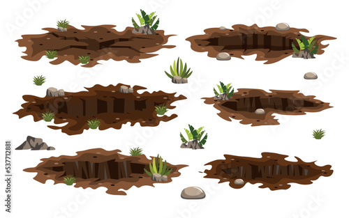Set of earth cracks and holes in cartoon style. Vector illustration of cracks on the ground of different sizes and shapes on white background.