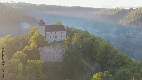 Historical castle Litice, Bohemia, Czech republic
Magical sunrise in the forest. Fantasy woodland background. photo