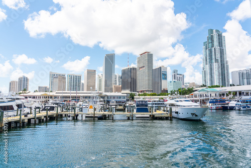 View of the Marina in Miami Bayside with modern buildings and skyline in the background photo