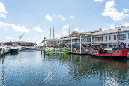 View of the Marina in Miami Bayside with modern buildings and skyline in the background photo