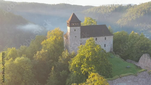 Historical castle Litice, Bohemia, Czech republic
Magical sunrise in the forest. Fantasy woodland background. photo