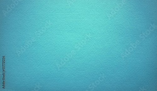 Blue background of ultramarine color. Photo of the texture of felt fabric in the color of a sea breeze. The fabric is a blue shade.
