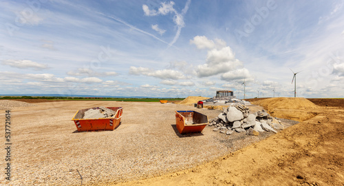 Web Banner Entrance construction site, driveway of building site. Pile of sand and Gravel for construction. limestone materials for construction industry.