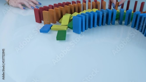 Falling Colored Dominoes photo