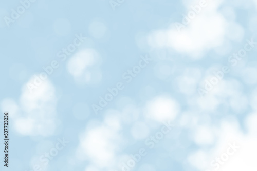 Abstract light blue blur bokeh for background, light blur on high light blue gradient abstract background in central design for presentation.