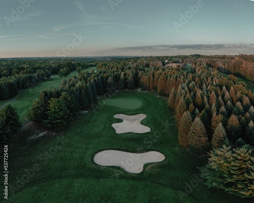 Aerial view of a green rural golf course in Otsego, Michigan photo