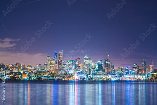seattle cityskyline at night with reflection on water. photo