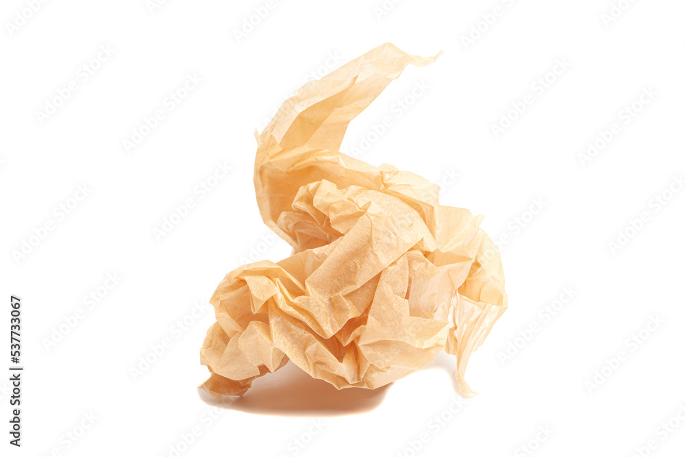 crumpled brown baking paper sheets isolated on white background crumpled brown baking paper sheets isolated on white background