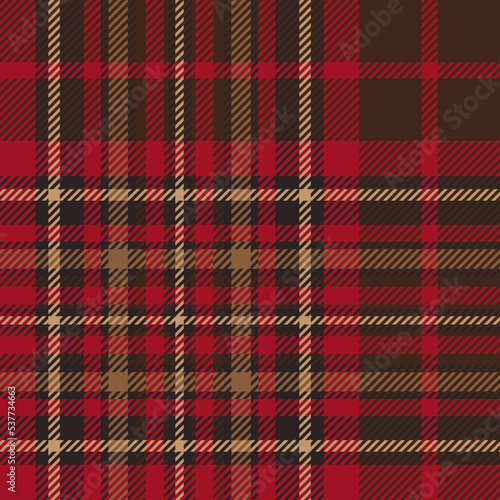 Red and brown tartan plaid. Scottish pattern fabric swatch close-up. 