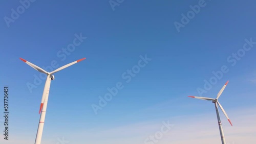 Wind turbines. Wind generator. Renewable energy sources. Environmental protection. Respect for the environment. Innovation. Electricity generation. Friendly industry to environment. Wind farm.