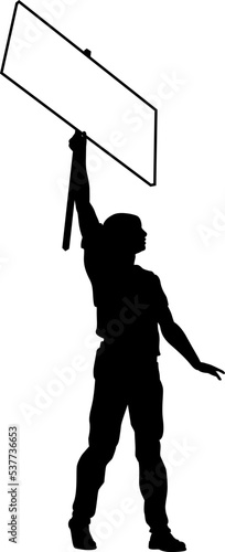 Protestor or demonstrator at a demonstration march, picket line or strike protest rally in silhouette. Holding up a banner or picket sign board placard.