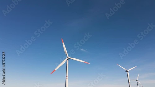 Wind turbines. Wind generator. Renewable energy sources. Environmental protection. Respect for the environment. Innovation. Electricity generation. Friendly industry to environment. Wind farm.