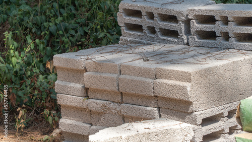 Concrete bricks and blocks on the street, building material for repair and construction photo