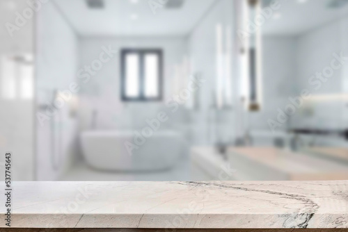 Empty marble top table with blurred bathroom interior Background. for product display. 
