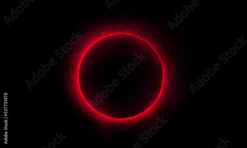 Technology red bright circle on black background.