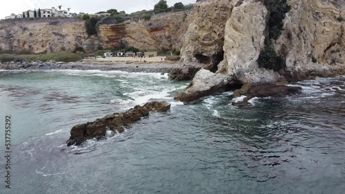 Rancho Palos Verdes, California by Drone 4k. View of a Cliffside Cave. Terranea Beach.