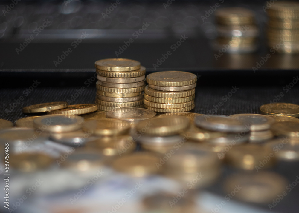 euro coins and computer keyboard euro coins and computer keyboard