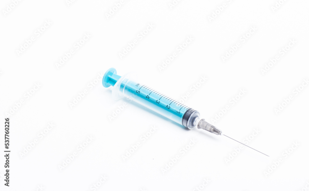 Disposable plastic syringe prepared for injection and vaccination in the hospital. The concept of medicine and health Disposable plastic syringe prepared for injection and vaccination in the hospital. The concept of medicine and health