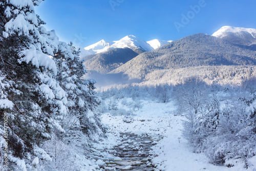 Bansko  Bulgaria travel winter landscape panorama of snow Pirin mountain peaks and river Glazne
