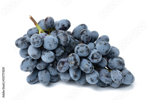 Ripe blue grapes on a white isolated background, wine grapes