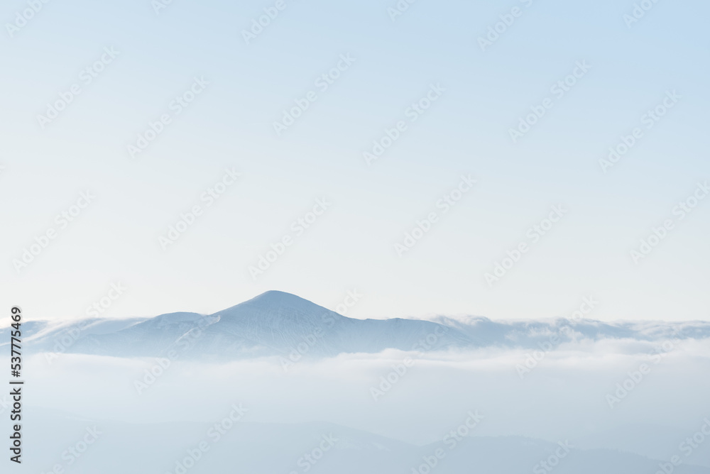 Mountain top in the clouds