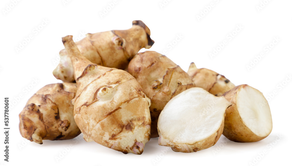 Heap of Jerusalem artichoke and pieces on a white background. Isolated Heap of Jerusalem artichoke and pieces on a white background. Isolated