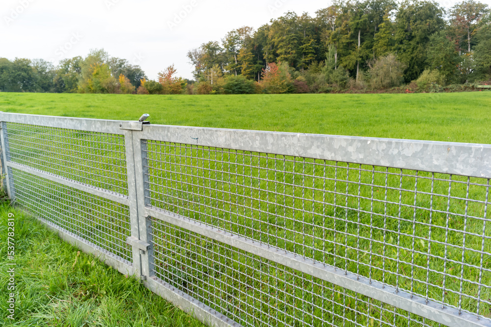 gate and fence on the field gate and fence on the field