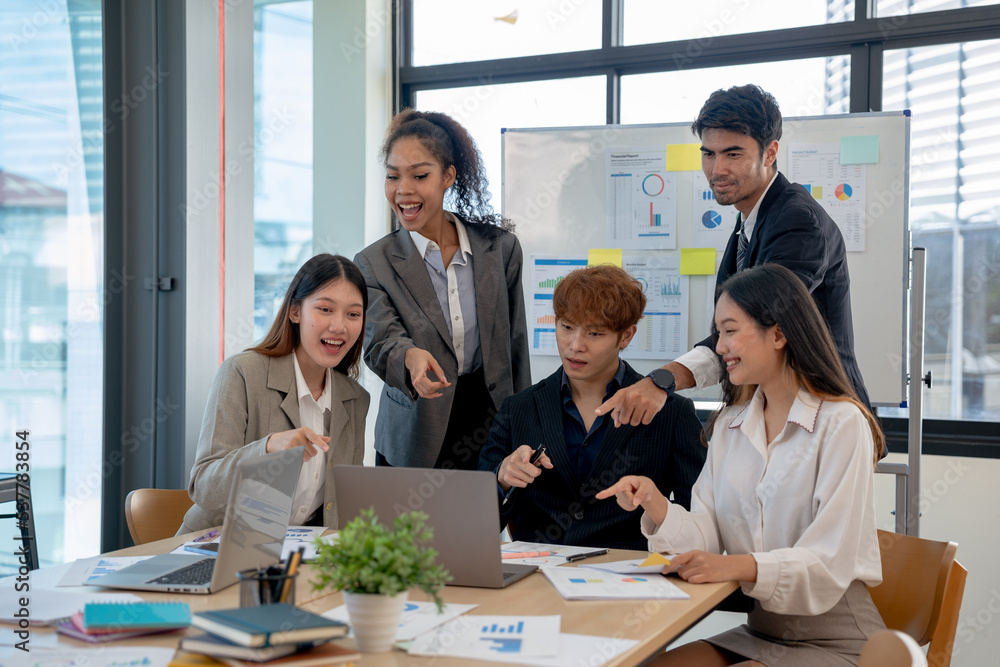 Creative young Asian businesspeople meeting to exchange ideas from each department to drive new projects at the meeting.