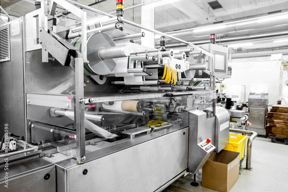 Production of chocolates. Sweets food factory automated industrial line Production of chocolates. Sweets food factory automated industrial line