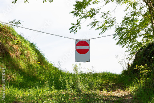 Prohibited direction sign on a country road in Belvedere Fogliense near Pesaro and Urbino in the Marche region of Italy photo