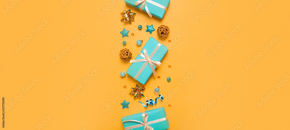 Christmas and New Year banner with gift boxes and decorations on colored background top view, flat lay