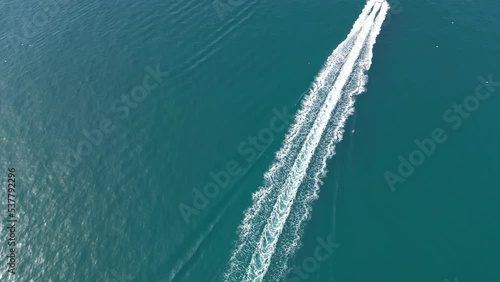 Aerial view of a boat in the Atlantic Ocean, Arrabida Natural Park, Portugal photo