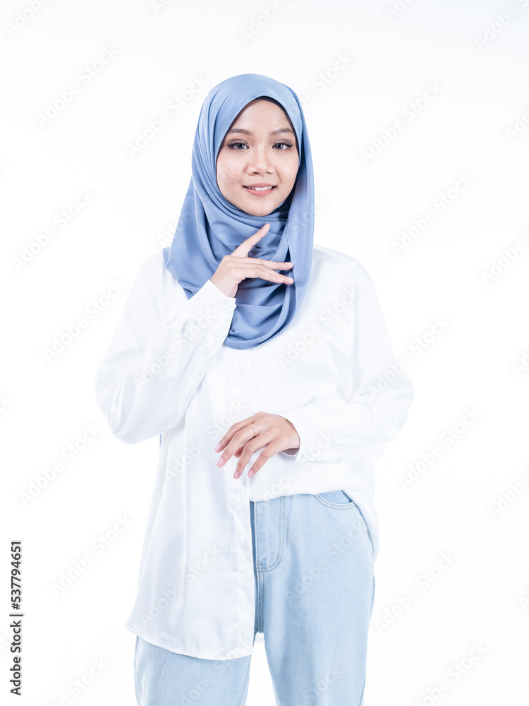 Portrait of a beautiful Muslim female model wearing modern and stylish casualwear with hijab isolated white studio background. Modern hijab fashion and beauty concept Portrait of a beautiful Muslim female model wearing modern and stylish casualwear with hijab isolated white studio background. Modern hijab fashion and beauty concept