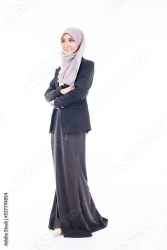 Portrait of Muslim woman in office attire and wearing a hijab. Asian woman in a corporate world. Formal corporate outfit and elegant appearance. Corporate or business people concept. Isolated