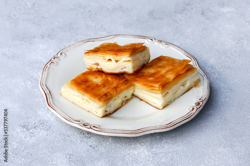 Delicious Turkish Food, 3 slices of tray pastry (Turkish Name : Su Böreği) photo