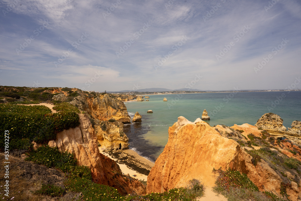 Coastal landscape with sea, rocks, beaches and horizon
