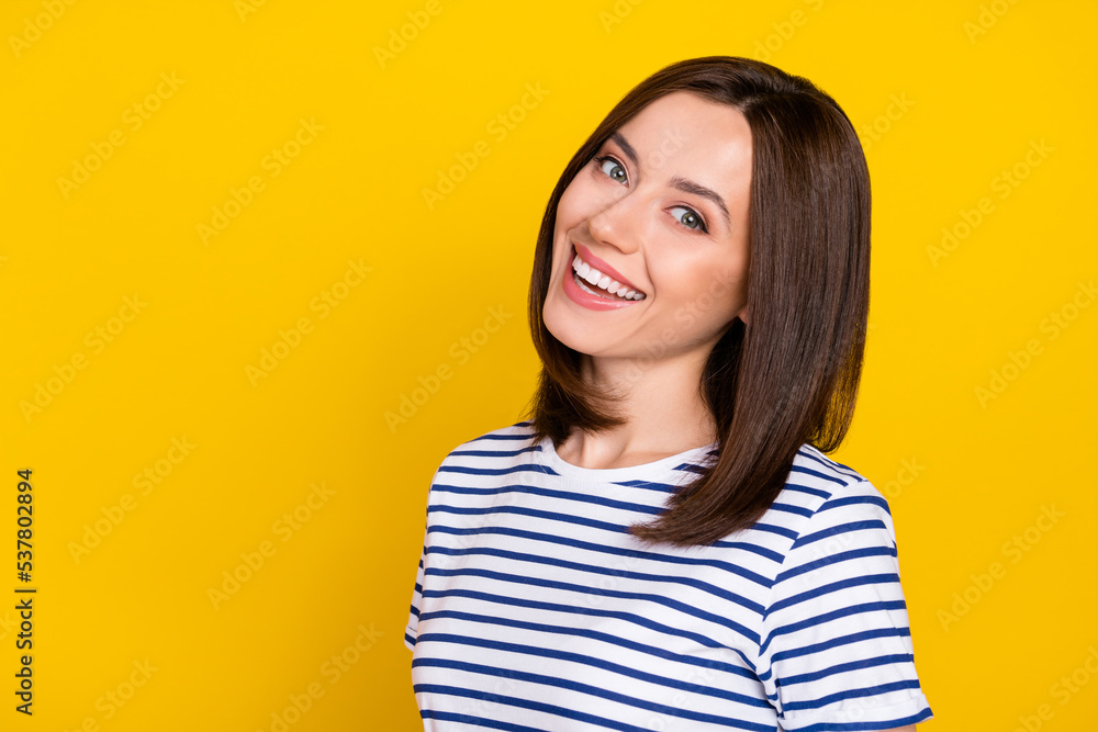 Photo of gorgeous pretty lovely girl bob hairstyle dressed striped t-shirt advertising dental clinic isolated on yellow color background Photo of gorgeous pretty lovely girl bob hairstyle dressed striped t-shirt advertising dental clinic isolated on yellow color background