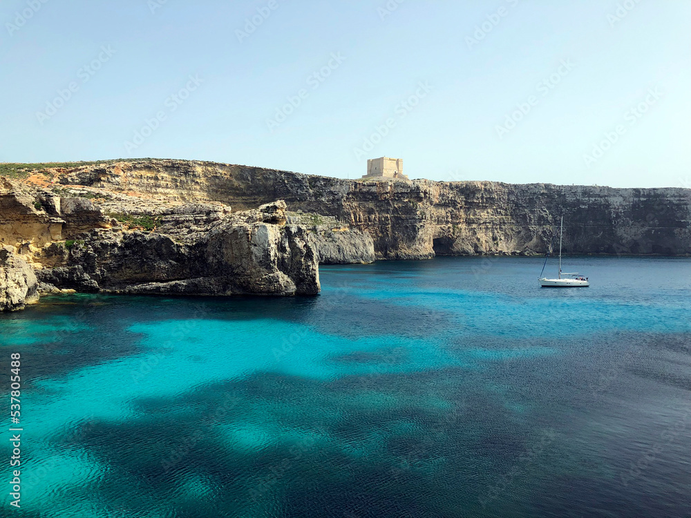 Comino island horizontal panorama, Maltese islands. Blue lagoon and Comino coast. Maltese seascape. small island of the Maltese archipelago, in the Mediterranean Sea. Maltese bird sanctuary and nature