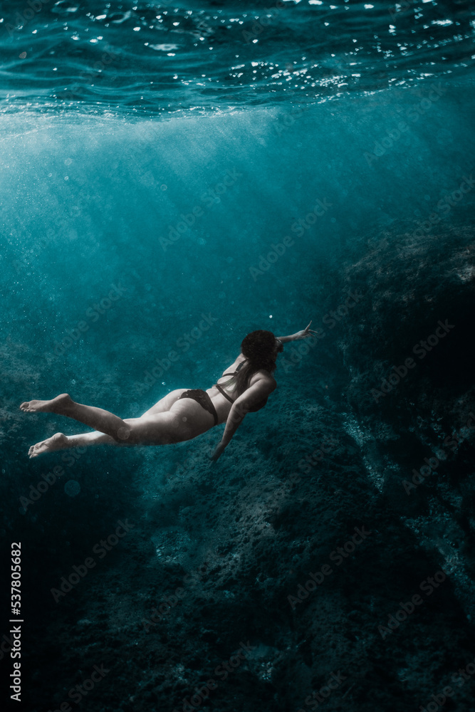 underwater girl who swim in deep ocean 01
