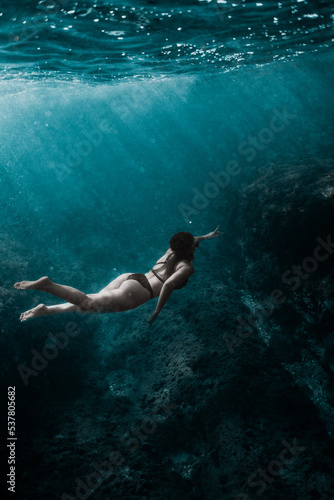 underwater girl who swim in deep ocean 01