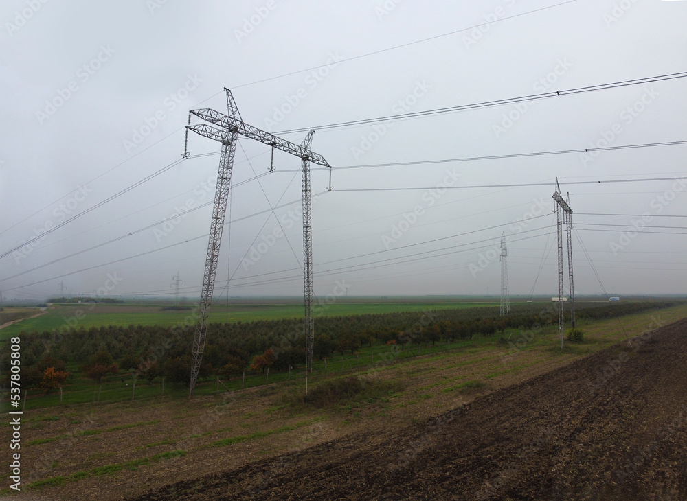 Power lines spreading across the landscape. Energy crisis concept Power lines spreading across the landscape. Energy crisis concept
